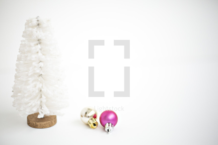 white bottle brush Christmas tree and ornaments 