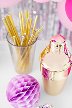 cocktail shaker and straws 