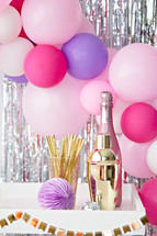 balloon arch and champagne 