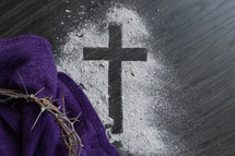 Ashes cross with crown of thorns and purple cloth