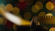 Shining Christmas light on a movie film background 