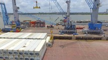 Rio Grande do Norte / Brazil - February - 2018  big crane unloading lifting containers in a port in Brazil 
