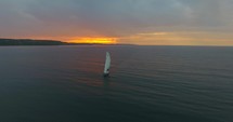 Sailboat Aerial Sunset Lake Michigan Pull Back