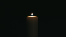 candle in darkness 