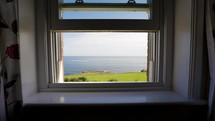View through window of holiday cottage on beautiful English coast