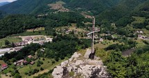 Wooden cross on top of a mountain in Romania.