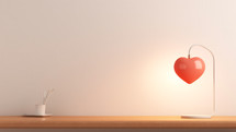 Heart shaped lamp giving light to the room