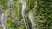 Aerial view of winding road In towering canyon of Cheile Bicazului in Romania.