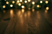 Christmas tree lights and wood floor 