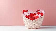 Colorful hearts inside a basket 