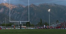 Mountains and a football field 