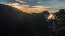 time-lapse, rising, clouds, steam, mountains, sunrise, outdoors 