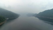 Flight Over Foggy River