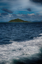 view of an island from a boat 