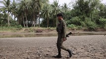 Asian Soldiers Walking Through Dry Riverbed War Warfare Military