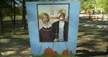 Happy, smiling children, brother and sister at Halloween Pumpkin Patch in autumn, fall season.