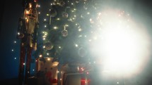 The Christmas tree in the night with nutcracker toy