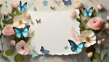 flat lay design with butterflies and pastel flowers surrounding white paper with torn edges, suitable for a title or other text