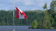 4K Slow Mo Canadan Flag Tight Shot Flapping In The Breeze Quetico Wilderness