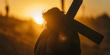 Silhouette of Jesus carrying the cross