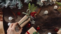 Christmas presents background on wooden table vertical shot
