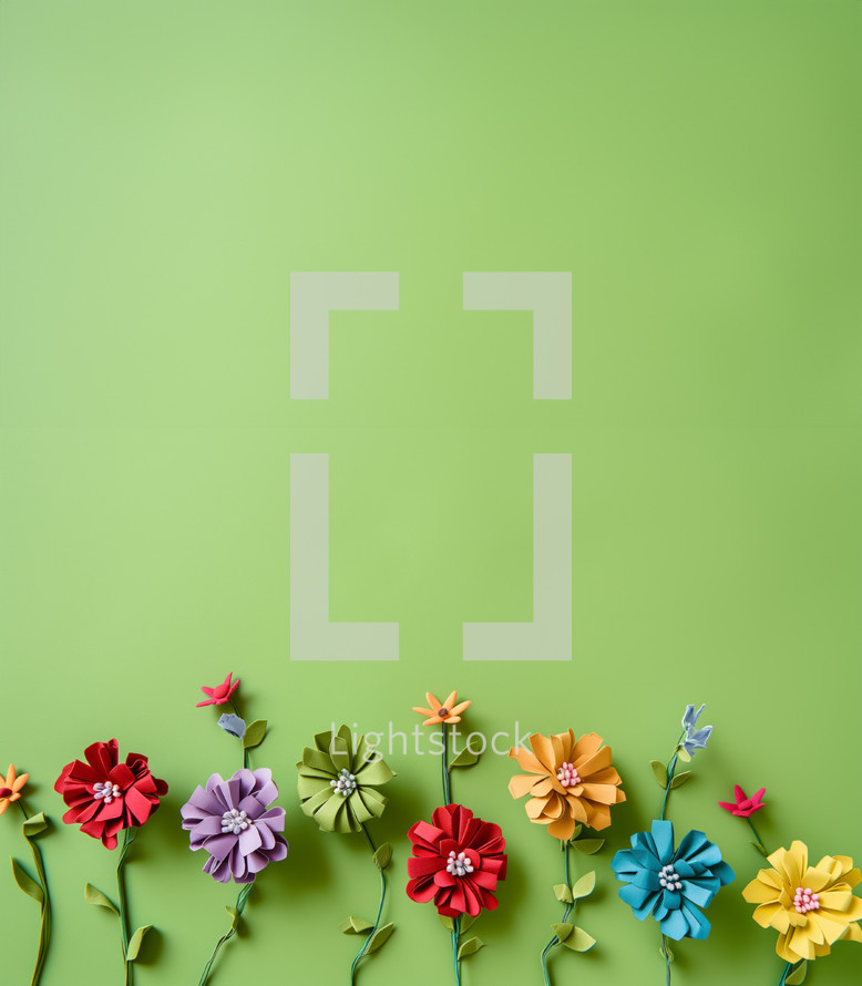 AI Generated Image. Flat lay of the paper colorful handmade flowers on a green background