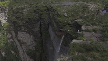 Drone orbits to the right over top of Fumaça waterfall in Chapada Diamantina, Brazil