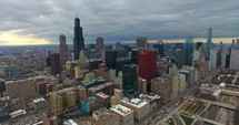 4K Aerial Chicago Skyline Buildings City Urban Establishing Shot Flying Cna Building Willis Tower Helicopter Rising Orbit Right