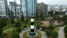 Aerial shot of lighthouse in middle of park