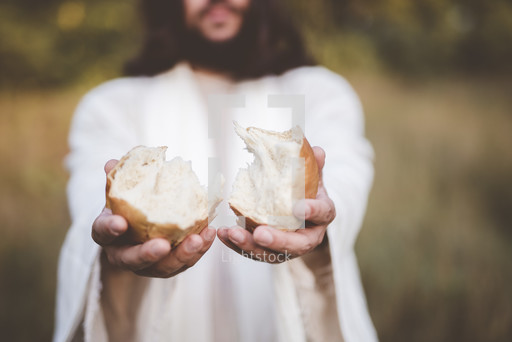 Jesus breaking bread — Photo — Lightstock