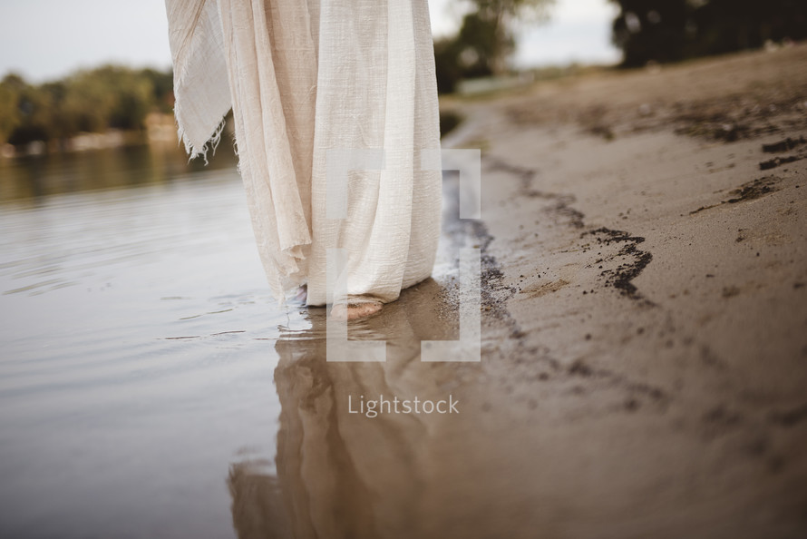 Jesus walking on a shore 