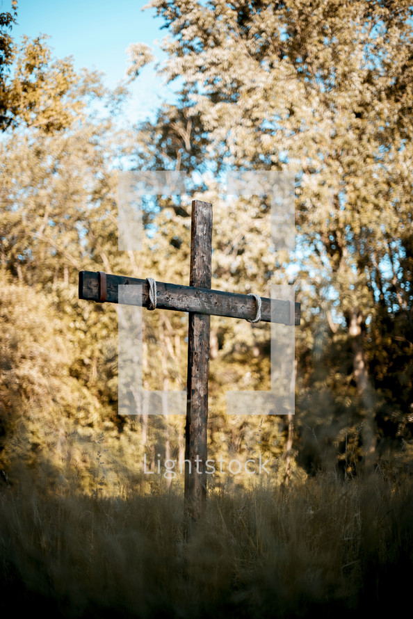 wooden cross outdoors in fall 