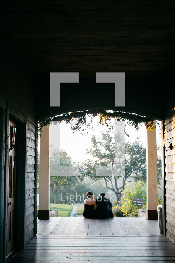 couple sitting on a southern porch 