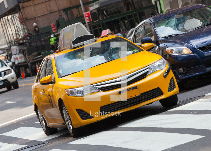 yellow taxi cab in NYC
