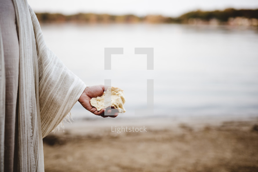 Jesus holding bread 
