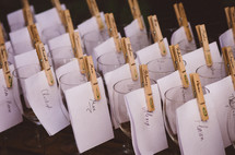 names on wine glasses at a wedding reception 