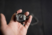 man with a pocket watch 