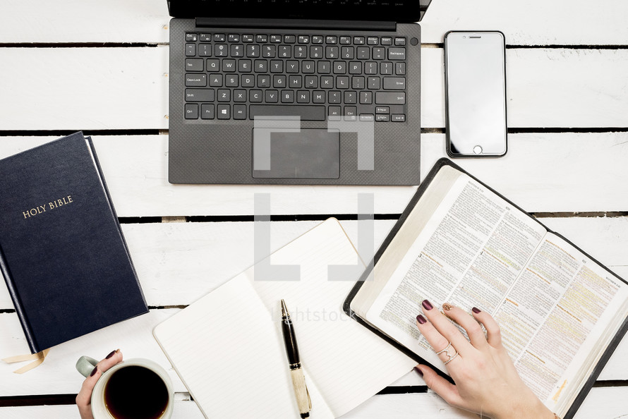 woman studying scripture at her desk 