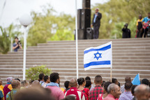 Israeli flag in a crowd 