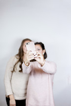selfies mother and teen daughter portrait 