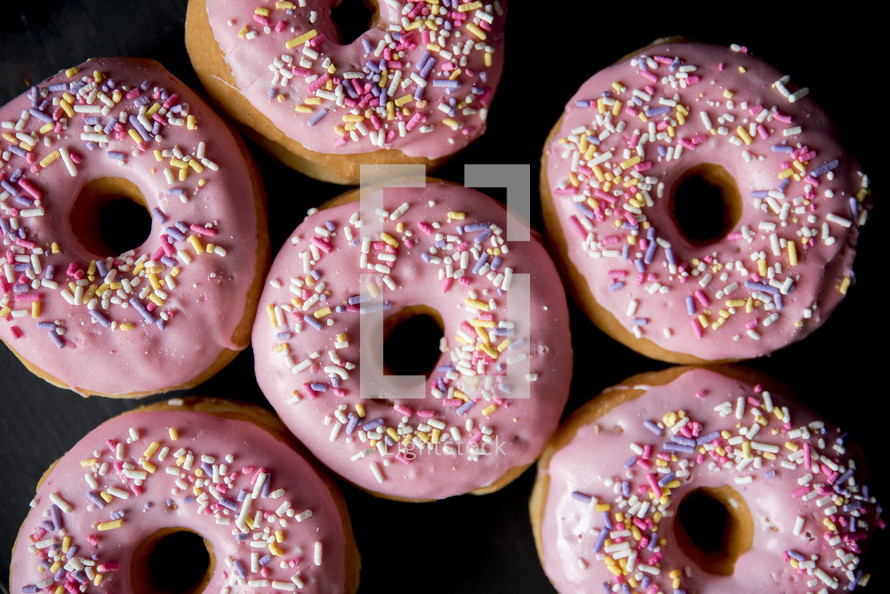 pink sprinkled donuts 
