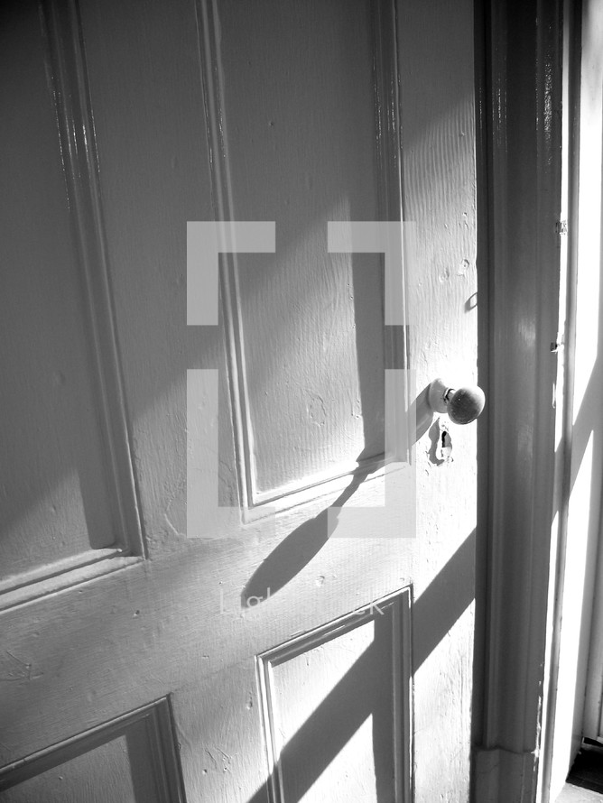 shadows and sunlight on a door 