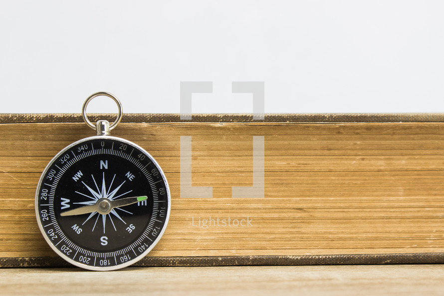 compass and Bible pages 