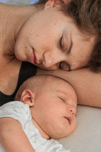 sleeping mother and infant 