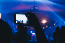 taking a picture of a concert with a cellphone 
