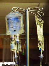 In medicine and hospital patient care, saline solution is a solution of sodium chloride , table salt in water for intravenous)application and tissue irrigation, most commonly used is sterile normal saline, containing 9.0 g of salt per liter (0.90%) found in hospitals and is attached to the patient through a hose to feed into their veins for repairing nerve endings, tissues and cells. 
