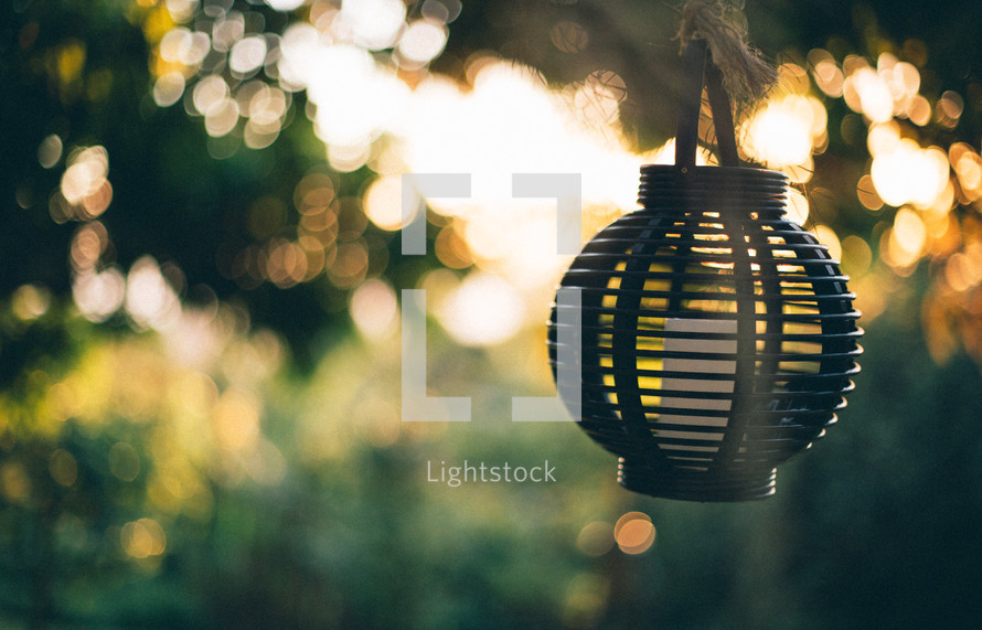 an outdoors hanging lantern  