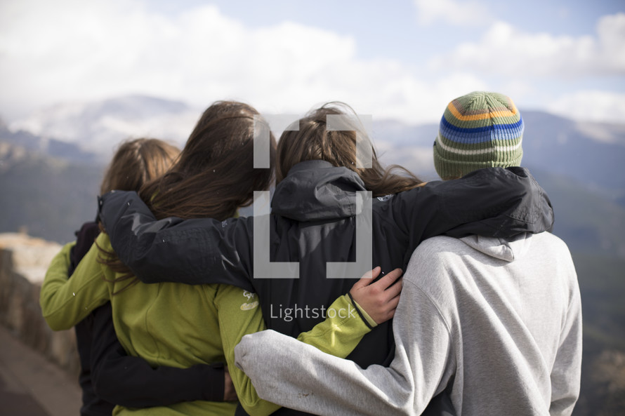 embracing on a mountaintop 