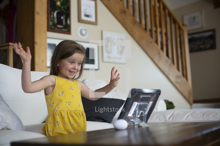 excited child on a video chat 