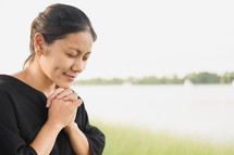 a woman in prayer 